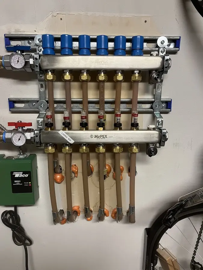 Plumber performing Water Heater Repair at a residential property in Tillamook